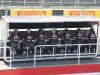 Red Bull engineers monitor their team from the pit lane.