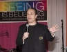 Emcee Michael Landsberg entertains guests at the 80s-themed dinner dance. 