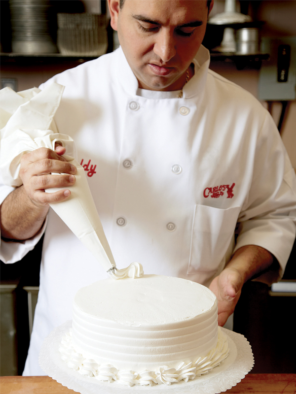 Bartolo Buddy Valastro Jr applies a frosted accent to a simple yet 