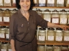 Evelyn Dorfman of Thuna Herbals stands behind her expansive herb collection. Among her favourites are yarrow flower and Siberian ginseng. (Photo by William Lem)