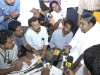 Amma speaks with journalists.