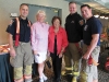 Brampton firefighters, Brampton Mayor Susan Fennell and Lois Rice.