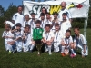 The Woodbridge Strikers show excitement and team spirit after becoming champions of the tournament.