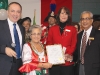 Vaughan Mayor Maurizio Bevilacqua presents an award to the Community & Home Assitance to Seniors charity.