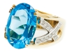 True blue, 18-karat yellow and white gold, glamorous diamonds and a blue  topaz stone.