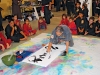 Tetsuhiro Hokama, a master of both Okinawan karate and the art of calligraphy, writes words of encouragement for young students.