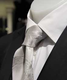 Neutral colours sparkle when paired with a silver tie.