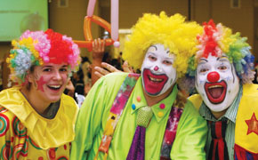 Three happy clowns